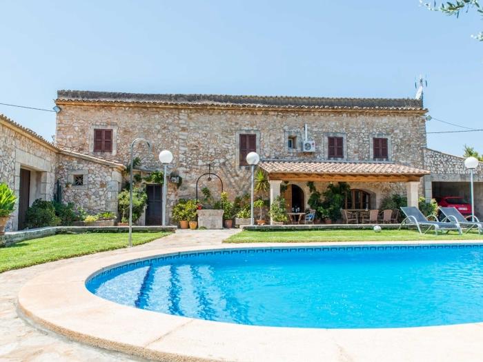 Cas Home casa con pista de tenis y piscina privada